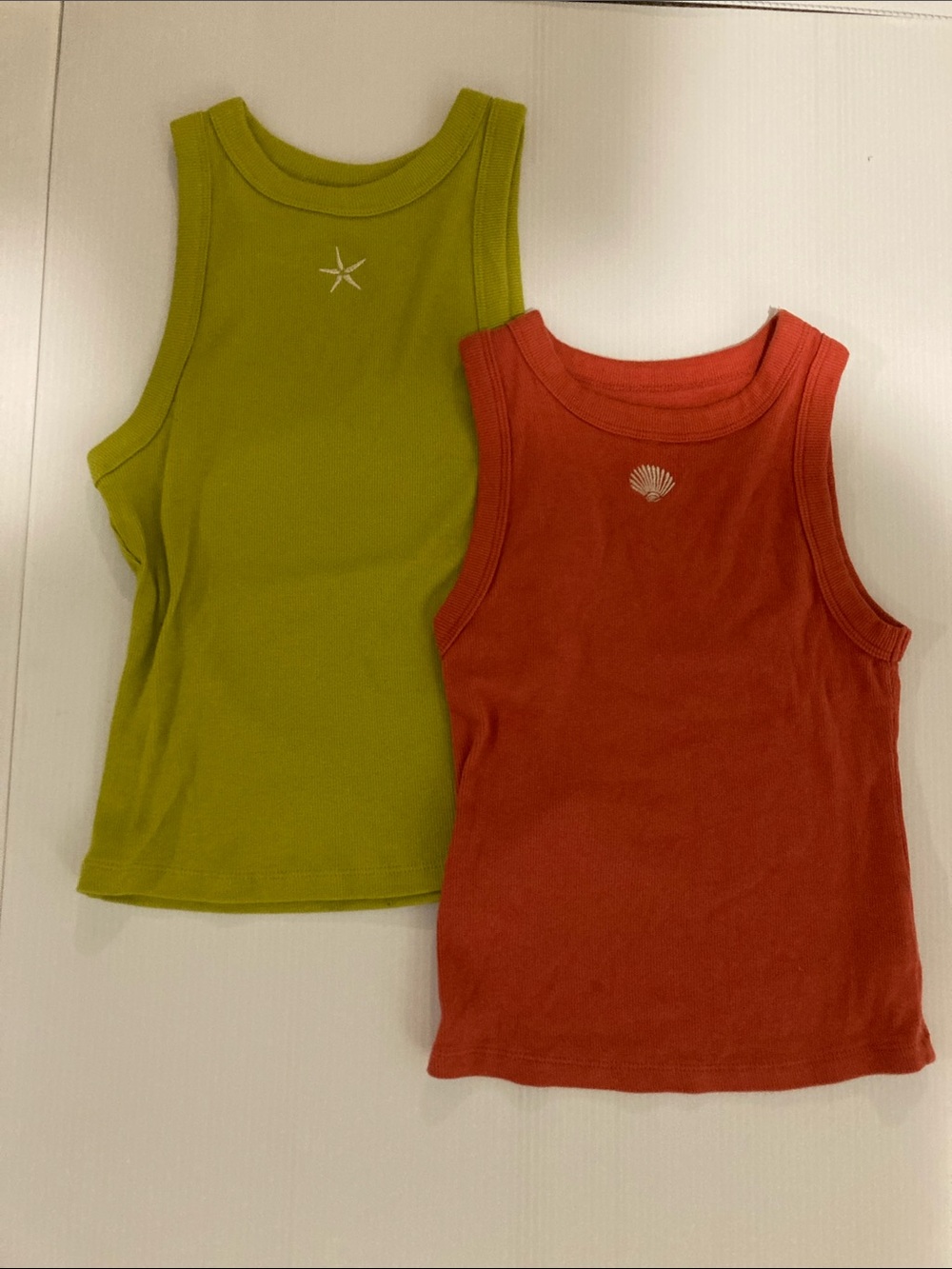 A new day ribbed tank tops 1 coral red with shell 1 green with starfish both xs